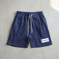 MAY20 shorts in navy, front view